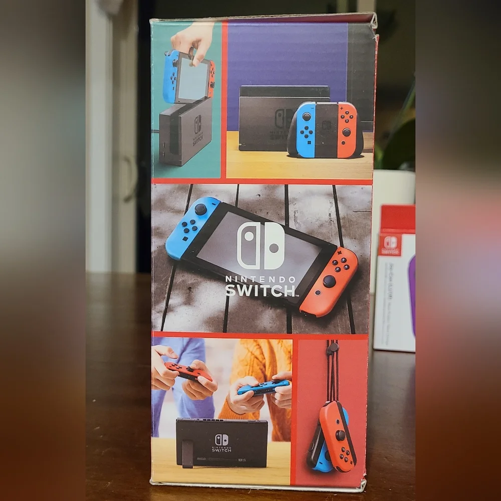 Nintendo Switch with Neon Blue & Neon Orange Joy‑Con and Purple/Yellow Set
